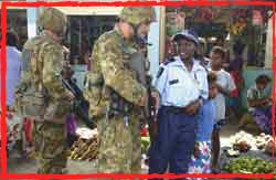 1RAR Ready Company Group Diggers secure Honiara Market Solomon Islands during an emergency deployment in response to the killing of RAMSI Policeman Adam Dunning Dec 2004