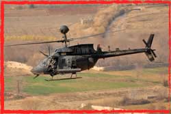 A US 82 Combat Aviation Brigade OH-58 over Argandab