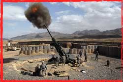 A US Army M777A2 155mm gun fires on the Taliban in Kandahar Province Afghanistan.