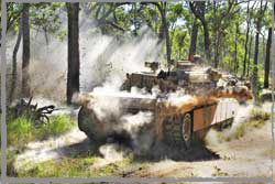 A 1st Armoured Regt M1A1 SA MBT fires its 120mm gun during a live fire assault at Shoalwater Bay.