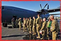 5th Brigade Diggers board a RAAF C-130J at Dili's Comoro Airport signalling the end of ADF operations in Timor Leste.