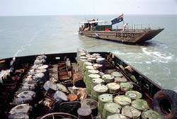 A 10FSB LCM8 Landing Craft from HMAS Kanimbla approaches a captured Iraqi covert mine layer in the Khawr Abd Allah in March 2003.