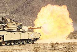 An Australian crewed USMC M1A1 Abrams fires its 120mm gun at the MCAGCC in California during Ex Gold Eagle 2013.
