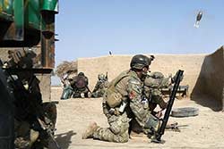 US SOF fires a 60mm mortar during a brutal contact in Shah Wali Kot in April