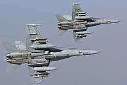 RAAF F/A-18 HUG Hornets armed with GBU-54 Laser JDAMs on operations over Iraq.