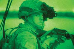 A Task Group Taji Digger instructs Iraqi Army Jundies during night operations training at the Taji Military Complex in Iraq.