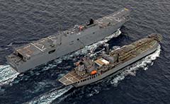 HMAS Sirius refuels HMAS Canberra South China Sea September 2021